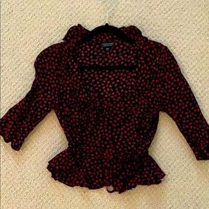 Cute flirty lip print peplum style top